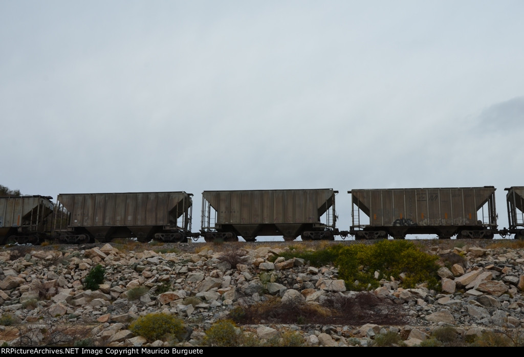 Cement hoppers passing by Hermosillo's Dam